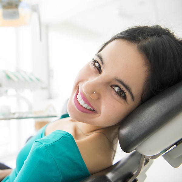 A woman in the dentist chair