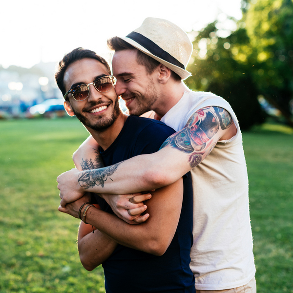 Two men hugging