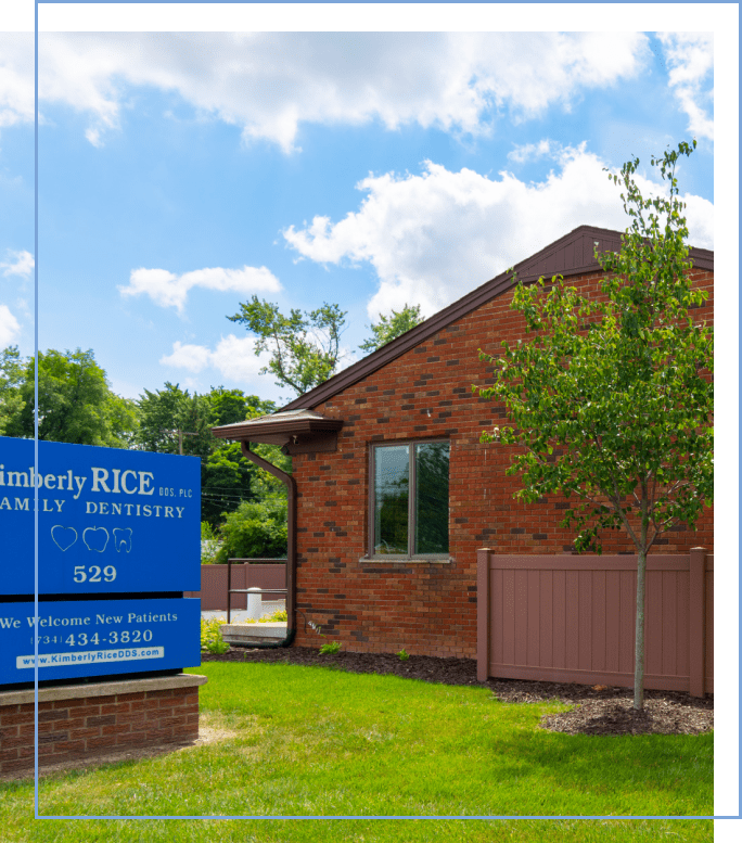 The outside of the office building with our sign